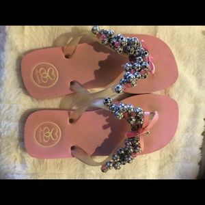 Three pair of flip flop/sandal Shoes.